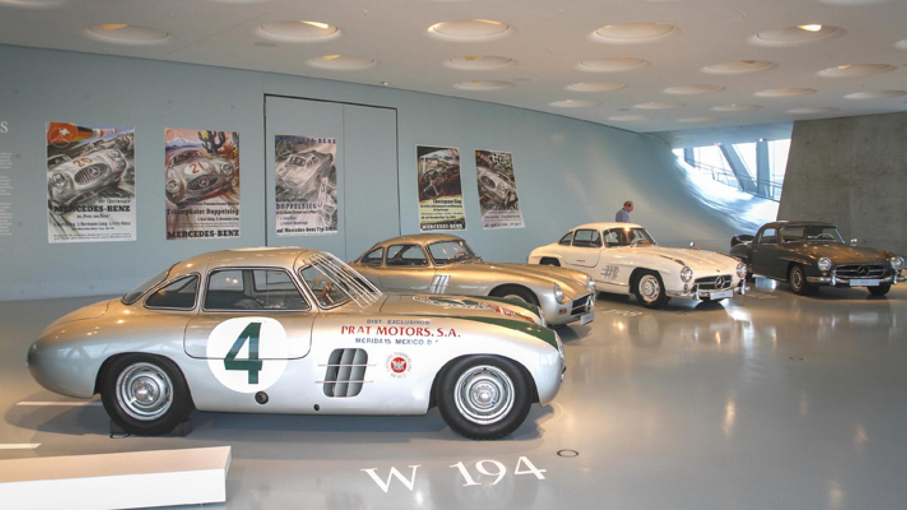 MERCEDES-BENZ SL: A room of full of Merc SLs is a good room. Racing gullwings mix with pedestrian gullwings. Check out those early racing posters on the wall, too for a hit of nostalgia.