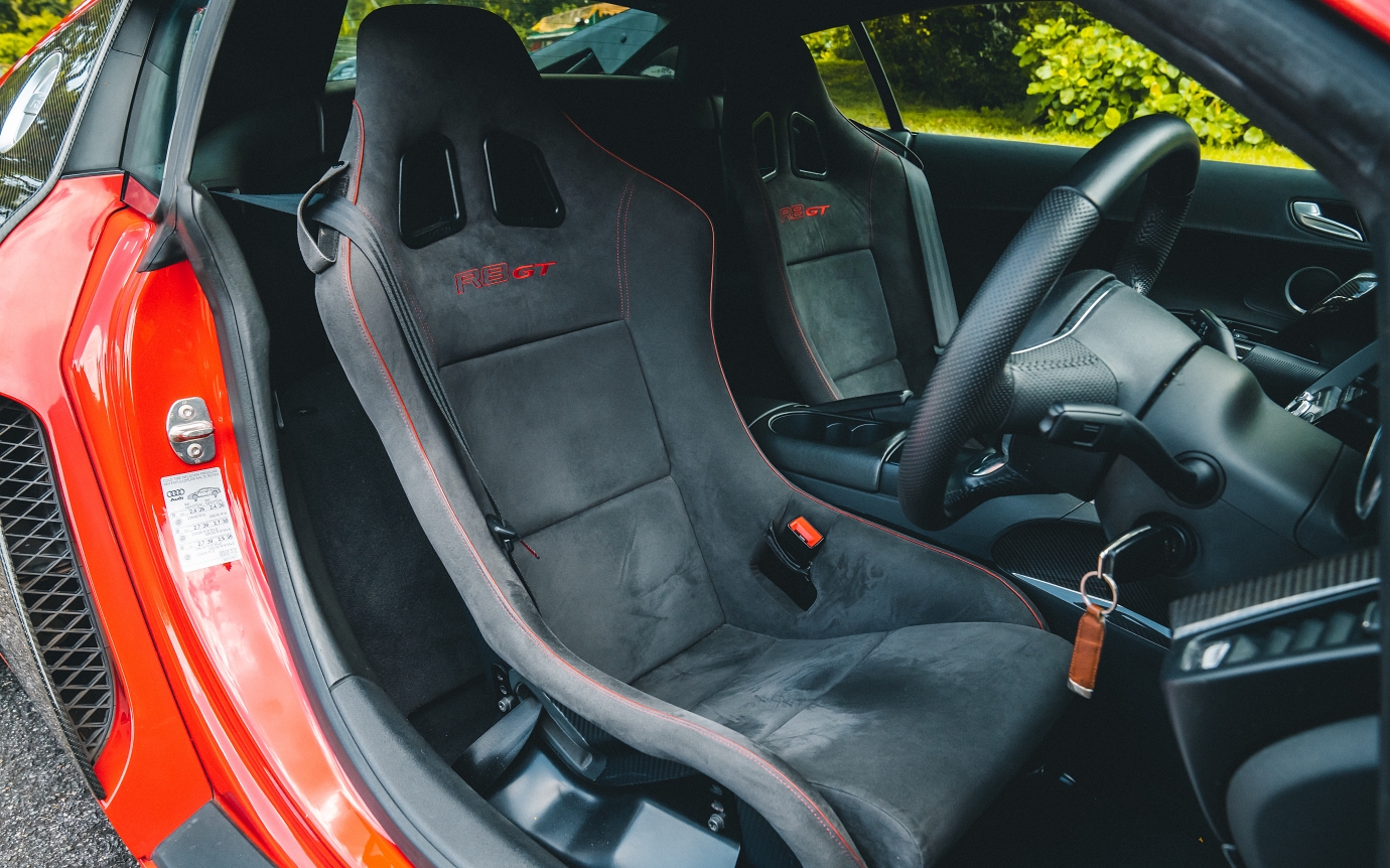 Snug and supportive carbonfibre sports seats from the R8 GT look and feel the part